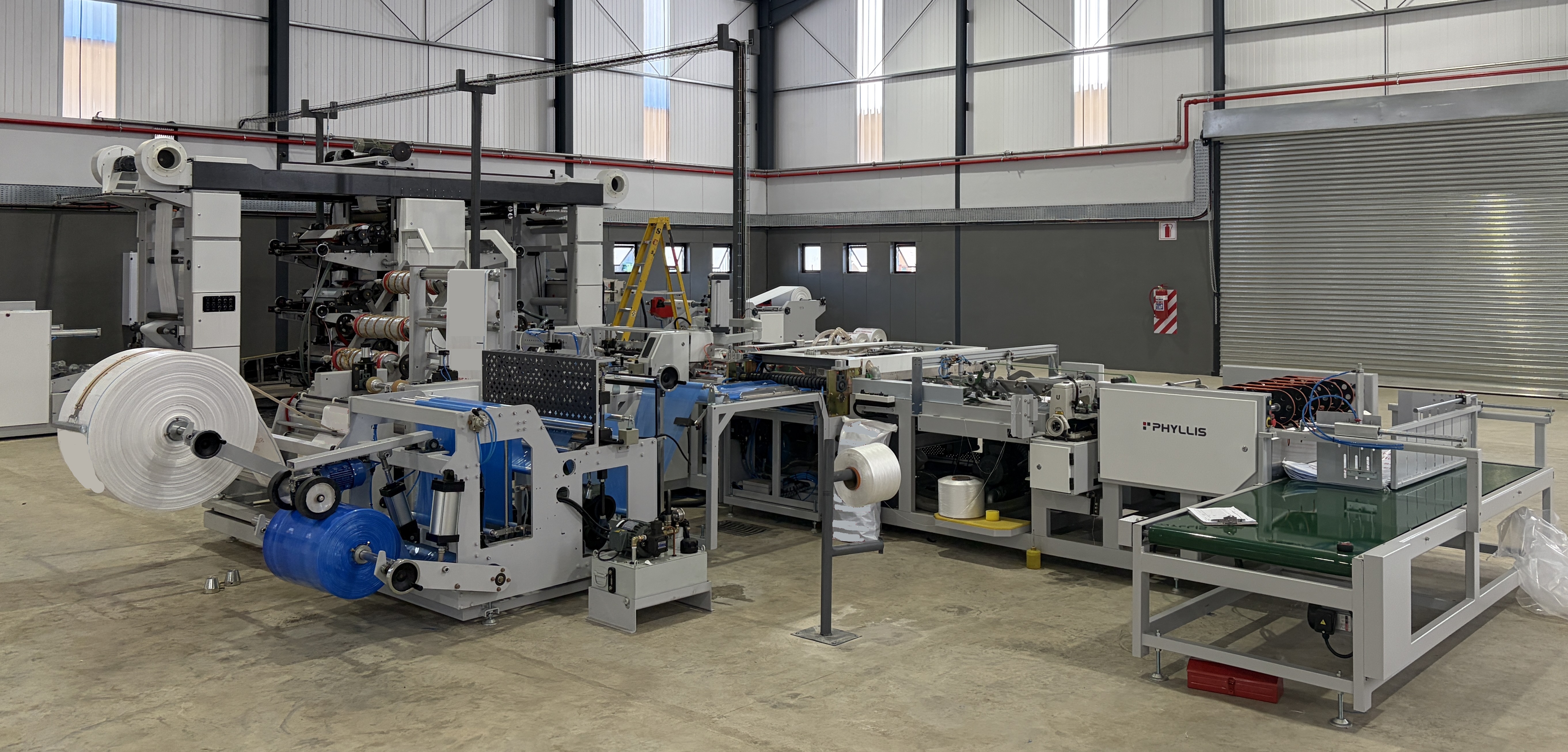 Automated PP Woven Sack Production Line with PE Liner Insertion Installed | PHYLLIS CO., LTD.